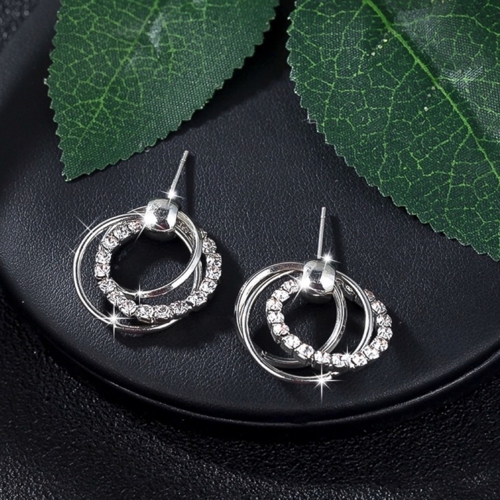 Any 2/$20! Silver Triple CZ Ring Stud Earrings - Picture 3 of 9